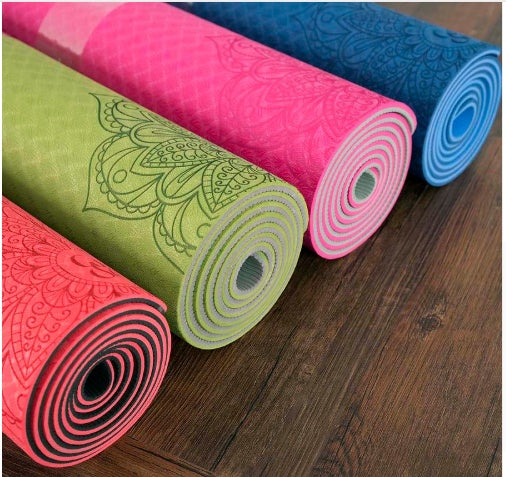 Colorful eco-friendly yoga mat collection with intricate designs for comfortable and sustainable practice